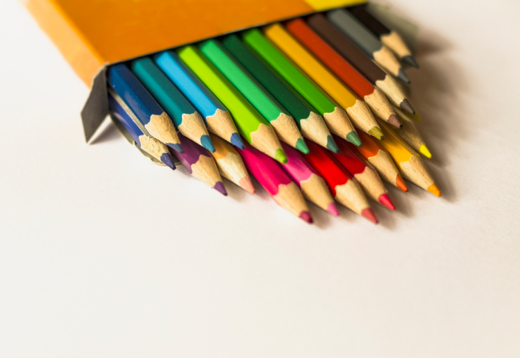 Diversity in Marketing: Part 2 Marketing Campaigns - Set of rainbow coloured pencils on a white background representative of diversity across the world